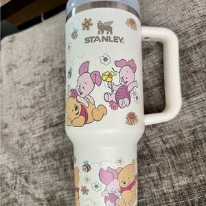 Stanley Cream Tumbler with Playful Characters